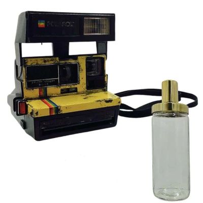 Blink Twice Vic Screen Used Instant Camera & Cocktail Shaker | VIP Fan Auctions