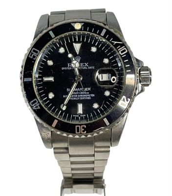 Lot 315 - Monsters: The Lyle and Erik Menendez Story (2022-) - Erik Menendez Faux Rolex Watch | Hanlin Auction Service