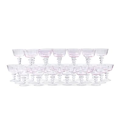 Lot 222 - A matched set of thirty-three mauve and clear glass cocktail glasses (33) | Bonhams