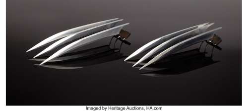 Hugh Jackman hero close-up stainless steel "Wolverine" claws from X2: X-Men United. ...