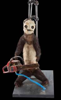 Lot 1273 - “Leatherface” chainsaw-wielding ferret from the Diet Mountain Dew commercial