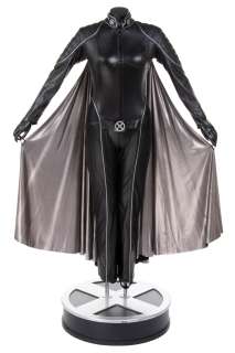 Halle Berry ’Storm’ black leather battle suit with silver cape on life-size display base from X-Men. | Profiles in History