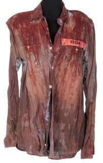 Dirk Gently‘s Holistic Detective Agency - Lot 57 - Fiona Dourif ‘Bartine ‘Bart‘ Curlish‘ blood-soaked denim prisoner shirt from Ditk Gently‘s...