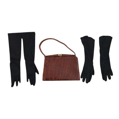 Lot 59: Marty Supreme Kay Rockwell Screen Worn Purse & Gloves Ch Multiple | VIP Fan Auctions