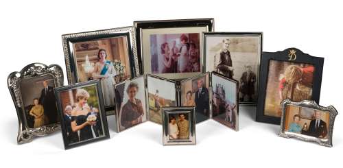 The Crown - Lot 112 - A selection of framed photographs of members of the cast of The Crown in character (9)