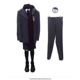 The Umbrella Academy (2019-2024) | Young Klaus Hargreeves’s (Dante Albidone) Umbrella Academy Uniform with additional Uniform Pants and Tattoo Sticker | Propstore