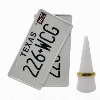 Lot #178: The Iron Claw Kevin Von Erich Zac Efron Screen Used Ring & License Plates