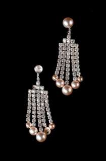How to Marry a Millionaire 1953 A pair of faux diamond and pearl earrings worn by Marilyn Monroe in the film | Bonhams