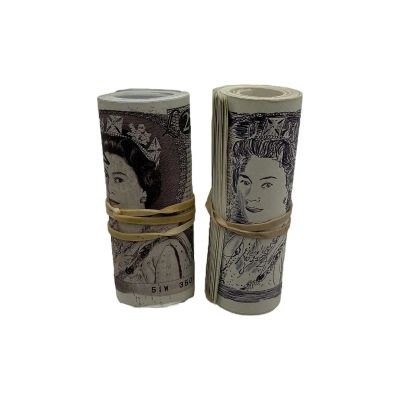 All the Devils Are Here Numbers (Burn Gorman) Screen Used 2 Piece Rolls Of Prop Money Set | VIP Fan Auctions