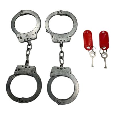 Lot 85: The Sheep Detectives Officer Tim Derry Screen Used (2) Prop Rubber, Plastic Handcuffs & (2) Handcuff Key Set | VIP Fan Auctions