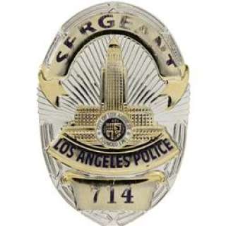 Lot 24096 - Dan Aykroyd‘s Badge from "Dragnet"