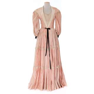 Lot 124 - Maureen O’Hara pumpkin and ivory striped period dress and riding hat from The Foxes of Harrow