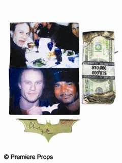 Screen Used Batarang and Prop Money from The Dark Knight | Premiere Props