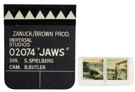 JAWS (1975) - Lot #233 : Shark Tooth Clapperboard with Framed Unpublished "Bruce" Shark Polaroids