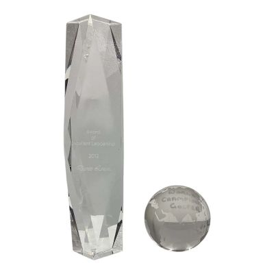 Lot #76: Play Dirty Lozini Screen Used Trophy & Globe Trophy