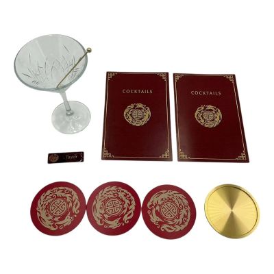 Lot 170: Play Dirty Night Club Screen Used Coaster And Twizzle Set, Martini Glass, (2) Cocktail Menus, (3) Coasters & Staff Name Tag | VIP Fan Auctions