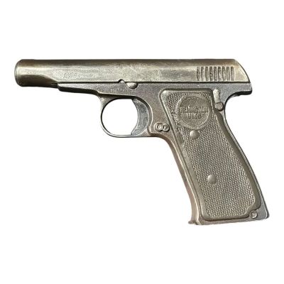 Lot 51: Marty Supreme Mitch Screen Used Prop Non-Functional Solid Plugged Remington Pistol | VIP Fan Auctions