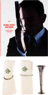 Spectre (Columbia, 2015), Group of (3) Props and Blood, Sweat, and Bond: Behind the Scenes of Spectre (Dorling Kindersley, 2015). | Heritage