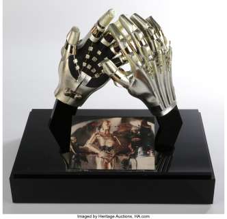 Pair of Anthony Daniels "C-3PO" hands used in Star Wars: Episode VI  Return of the Jedi donated in display case by George Lu...
