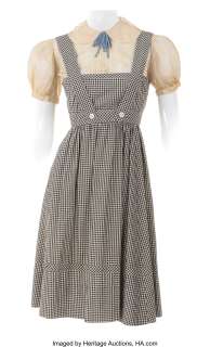 "Dorothy Gale" scene specific screen used black-and-white gingham pinafore dress from The Wizard of Oz.... | Profiles in History