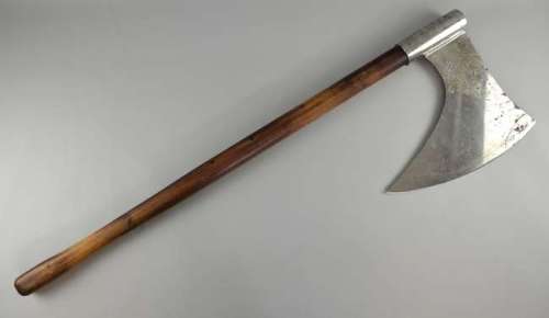 A prop axe, from an unknown production, with shaped wooden handle and etched steel head, length… | Ewbank’s