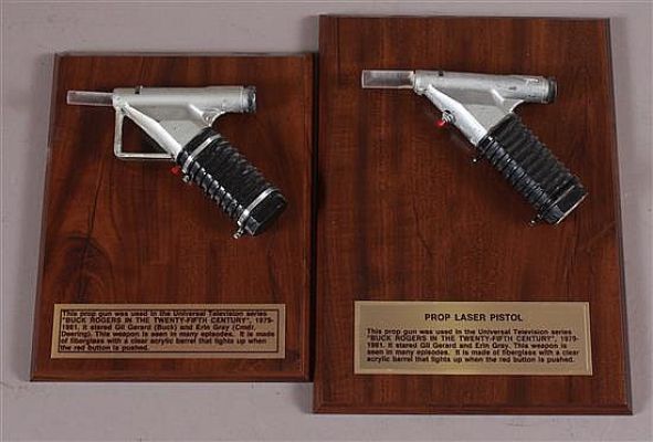"BUCK ROGERS IN THE 25TH CENTURY" - 2 MOUNTED PROP LASER PISTOLS | Apple Tree Auction Center