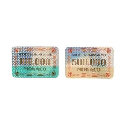 James Bond: Goldeneye (1995) | Lot  279. 100,000 and 500,000 Monaco Casino Chips | Propstore