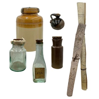 Lot 122: The Bluff Ercell Screen Used (3) Jars, (2) Bottles & (2) Maps | VIP Fan Auctions