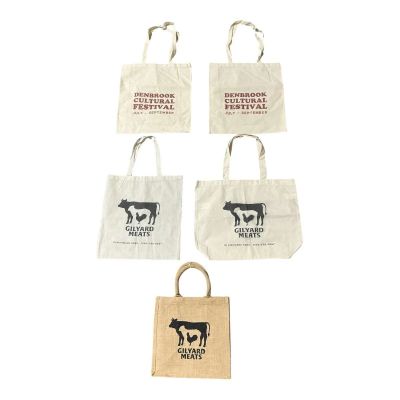 Lot 20: The Sheep Detectives Production Used (2) Gilyard Meat Tote Bag Set, (2) Denbrook Cultural Festival Tote Bag Set & Tote Bag | VIP Fan Auctions