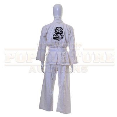 Lot 10 - Cobra Kai (TV) – Hawk’s (Jacob Bertrand) "Cobra Kai" Gi – 60-50 | Icons of Pop Culture