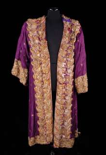 Lot 374 - Yul Brynne purple robe and whip from The King and I