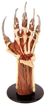 Lot 769 - Robert Englund "Freddy Krueger" screen-used organic/bio-mechanical hero bladed glove from New Nightm