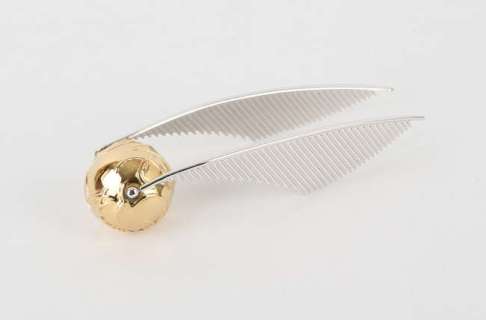 Harry Potter - A presentation ’Golden Snitch’, Warner Bros., the silvered metal ’Golden Snitch’… | Ewbank’s