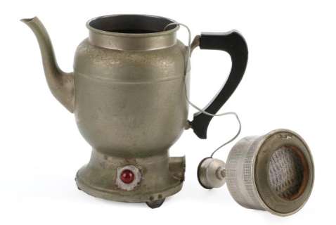 Lot 970 - Hogan‘s Heroes screen used hero coffee pot.