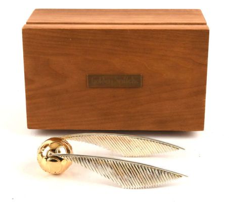 Lot 5092 - Harry Potter - A presentation ’Golden Snitch’, Warner Bros., the sterling silver and brass plated… | Ewbank’s