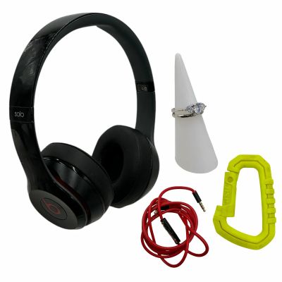 Lot 52: The Drama Young Emma Production Used Engagement Ring, Wedding Ring Band, Carabiner & Beat Headphone Set | VIP Fan Auctions