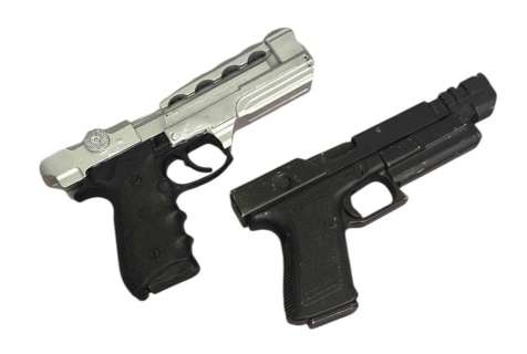 Lot 269 - The Adventures of Pluto Nash (2002) - Pair of Sci-Fi Pistols