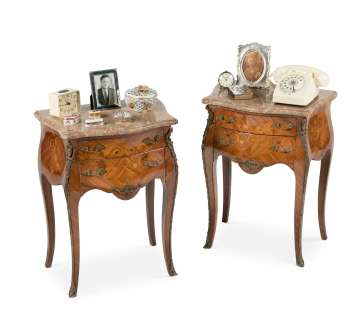 The Crown - Lot 117 - Claire Foy, Olivia Colman & Imelda Staunton (as the Queen): a pair of Louis XV-style kingwood, floral marquetry and gilt-metal mounted petite commodesFirst seen in Season 2, in the Queen‘s Bedroom set (qty)