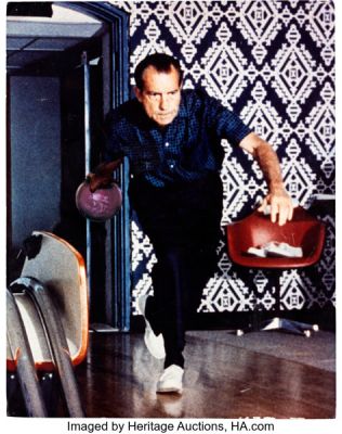 The Big Lebowski (Polygram, 1998), Jeff Bridges "The Dude" Screen-Used Photo Reproduction of Richard Nixon Bowling from Dude‘s Bungalow.