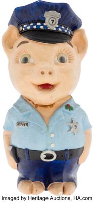 The Blues Brothers (Universal, 1980), John Candy’s "Burton Mercer" Screen-Used Chicago Police Piggy Bank. | Heritage