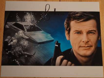 James Bond 007: The Spy Who Loved Me - Roger Moore (+) is James Bond 007 - autopgraph, photo, signed with Certified Genuine b´bc holographic COA | Catawiki