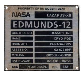 INTERSTELLAR (2014) - Lot #719 : Dr. Wolf Edmunds‘ Screen-Matched Distressed Grave Plaque