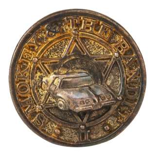 Lot 362 - Burt Reynolds | "Smokey And The Bandit II" Belt Buckle