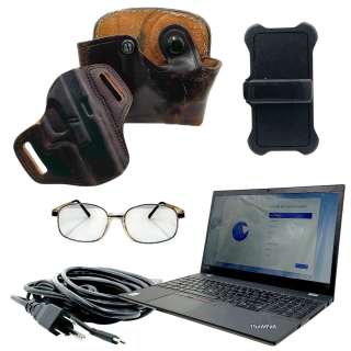 Eddington Joe (Joaquin Phoenix) Screen Used Gun Holster, Mag Holster, Phone Case, Glasses & Laptop | VIP Fan Auctions