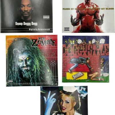 Lot 6: Onslaught Kovacks Screen Used Dmx Record Cover, Snoop Dogg Record Cover, Tha Doggfather Record Cover, Blink 182 Record Cover & Rob Zombie Record Cover | VIP Fan Auctions