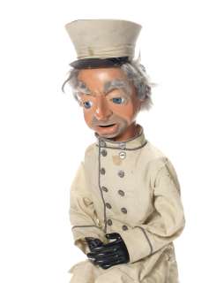 Lot 154 - Thunderbirds: A figure of Lady Penelope‘s chauffeur, Parker,