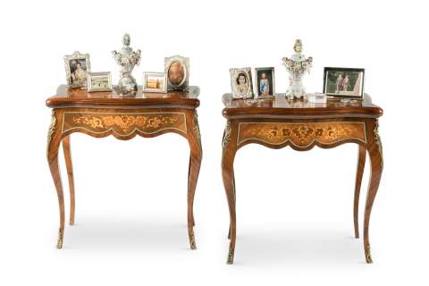 The Crown - Lot 118 - Claire Foy, Olivia Colman & Imelda Staunton (as the Queen): a pair of kingwood, tulipwood, fruitwood marquetry and gilt-metal mounted serpentine card tables, in the George III French-styleFirst seen in Season 2, in the Queen‘s Bedroom set (qty)