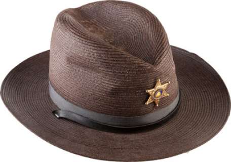 A Brown Straw Hat from "Cop Land."...