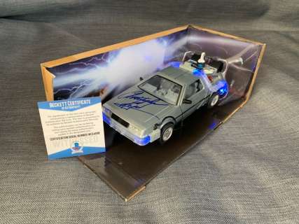 Back to the Future - Christopher Lloyd ("Doc") signed DeLorean model car - Beckett witnessed Coa | Catawiki