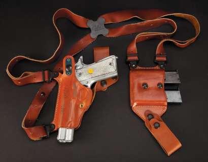 Lot 974 - Dwayne Johnson “Christopher Danson” prop Colt .45 and holster from The Other Guys